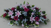 Cerise Roses, Stargazer Lilies and Gypsophilia